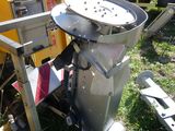 an image of a machine that is sitting in the grass