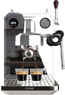 une image d'une machine à café avec deux tasses de café