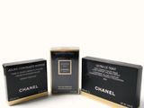 three boxes of chanel perfume on a white background