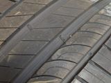 a close up of a tire on a white surface