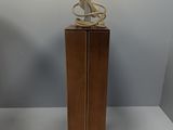 a lamp that is sitting on a table next to a lamp