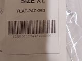 a label that says size xxl on the back of a bag
