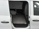 a white van with the door open on the side of the road