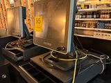 a picture of a cash register in a grocery store