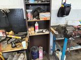 an image of a garage with tools on the shelves