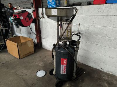 an image of a machine that is in a garage