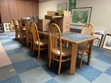 a table and chairs in a room with a blue checkered floor