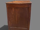 an old wooden cabinet with a door and a drawer underneath it