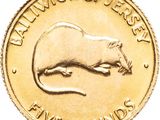 an image of a close up of a gold coin with a rat on it