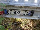 a license plate on the back of a truck