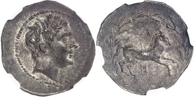 a close up of a coin with an image of a man on it
