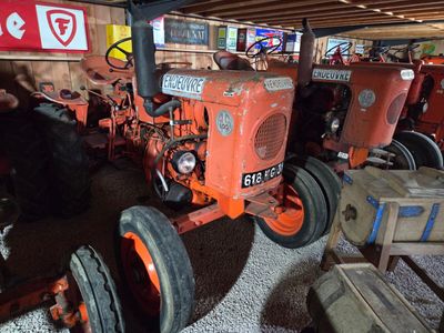 a tractor that is parked in a garage