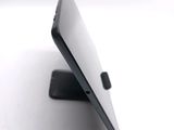 a close up picture of a tablet computer on a stand