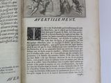 an open book with a picture of a man riding on a horse