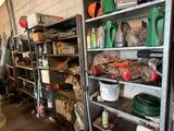 many shelves with various items on them in a garage