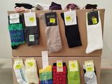 several pairs of men ' s socks are on display on a pallet