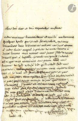 un gros plan d'un morceau de papier sur lequel on a écrit