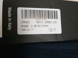 a label on the back of a hat that says,