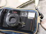 a camera that is sitting on top of a bag