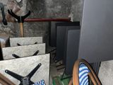 a pile of assorted items sitting in a room