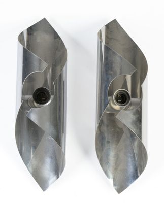 two pieces of metal that are sitting on top of each other