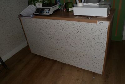 a microwave sitting on top of a counter in a room