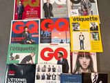 a lot of magazines and books on the table