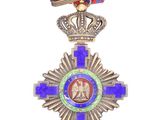 an image of a medal with a crown on top of it