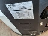 a picture of a black and white refrigerator with a label on it
