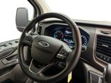 a steering wheel and dashboard of a vehicle