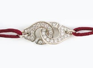 Bracelet « œil maléfique » plaqué argent, avec cordon rouge et cristaux