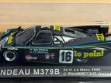 a model of a race car in a plastic case