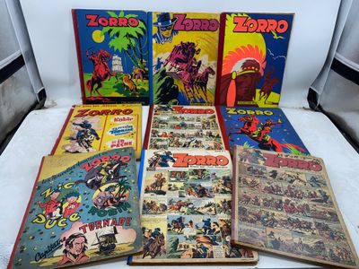 Six bandes dessinées sont posées sur une table avec un fond blanc.