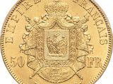 a close up of a gold coin on a white background