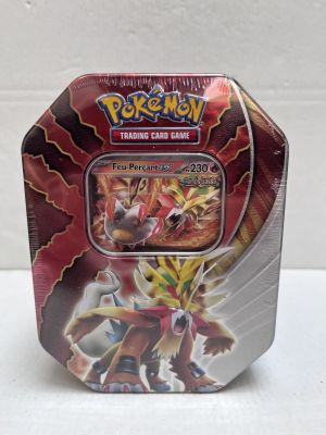 a close up of a box of pokemon trading cards on a table