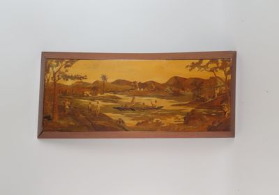 une image d'un tableau sur le mur d'une pièce
