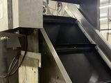 a conveyor belt with a conveyor belt attached to it