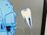 a picture of a painting of a tooth and a toothbrush