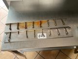 a metal table with a bunch of tools on top of it