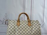 an image of a louis vuitton bag on a table