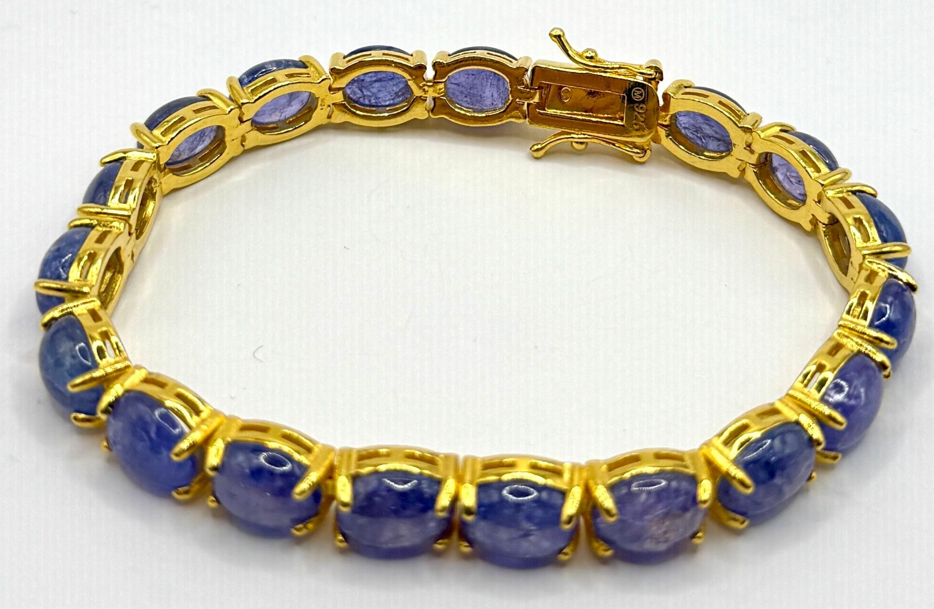 Bracelet en argent doré serti de tanzanites - PB : 23,07 g - Devis gratuit sur demande : Envoi postal en colissimo re...