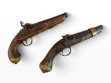une paire de pistolets anciens sur fond blanc