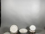 a lot of plates that are sitting on a table
