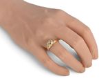 an image of a woman ' s hand with a gold ring on it