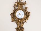 a clock hanging on the wall in a room