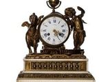 a clock that is sitting on top of a table