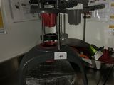 a machine that is sitting on a table in a kitchen
