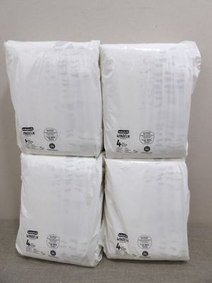 four bags of toilet paper stacked on top of each other