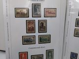 two books with stamps on them sitting on a table