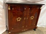 an image of a wooden cabinet with two doors and a black top